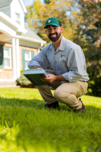 An expert examine the lawn for healthy and Green Grass, green grass Bel Air