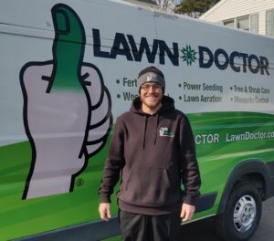 Lawn Doctor of Lower BuxMont technician by van