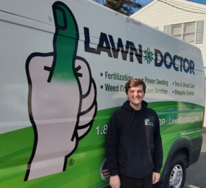 Lawn Doctor of Lower BuxMont technician by van