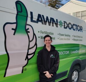 Lawn Doctor of Lower BuxMont technician by van