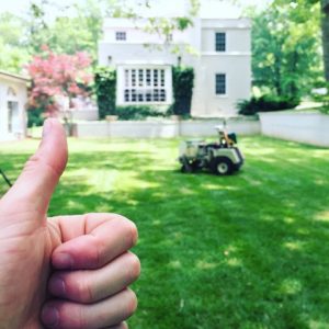 Thumbs up in front of lawn services in Chattanooga