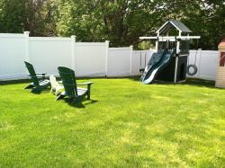 green back yard by lawn services in Long Island 