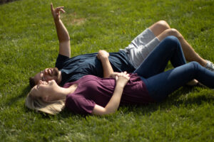 Couple on grass after Lawn Doctor provided Residential Lawn Care in Snohomish