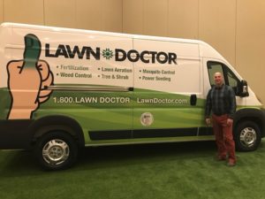 Our staff in front of the Lawn Doctor of Fort Collins van