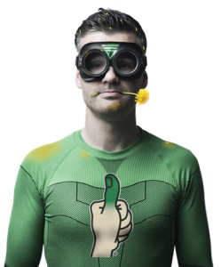 Funny male with goggles and green shirt with Lawn Doctor logo and dandelion in his mouth