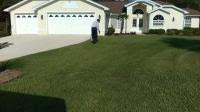 Lawn Doctor of Ocala-Homosassa walking the yard for lawn maintenance and treatment