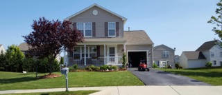 Lush front lawn services in Dover
