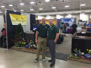 two lawn doctor employees at convention