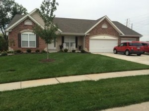 After a completed lawn care service project showing lawn fertilization in Clayton