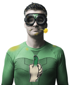 Man wearing shirt with green thumb logo showing lawn fertilization in Boston