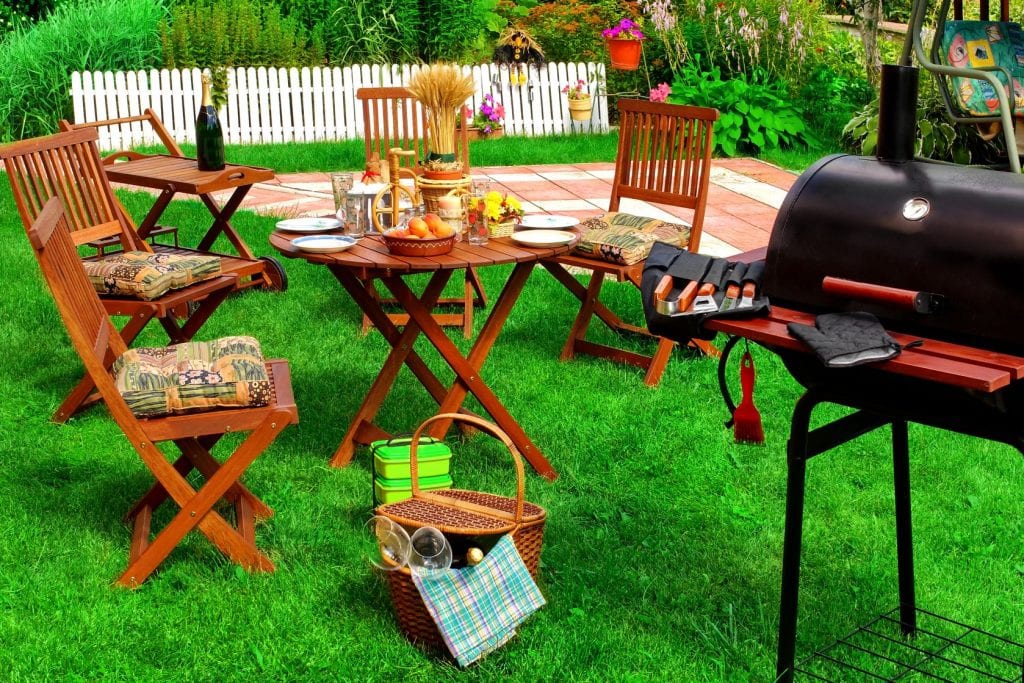 image of a mosquito-free backyard picnic table with chairs